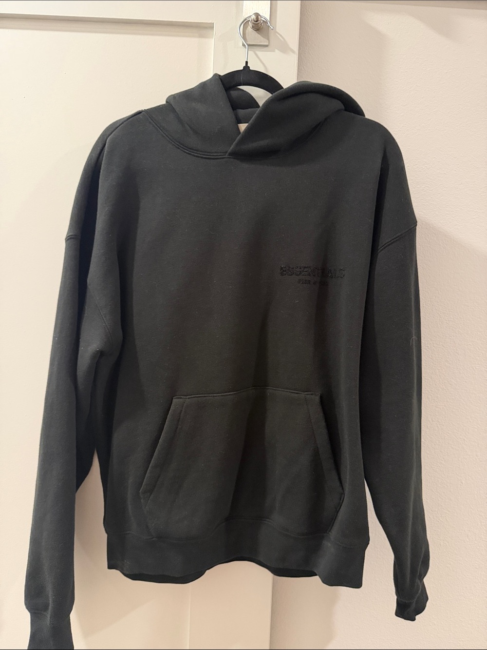 Essentials Black Pullover Hoodie with Subtle Logo